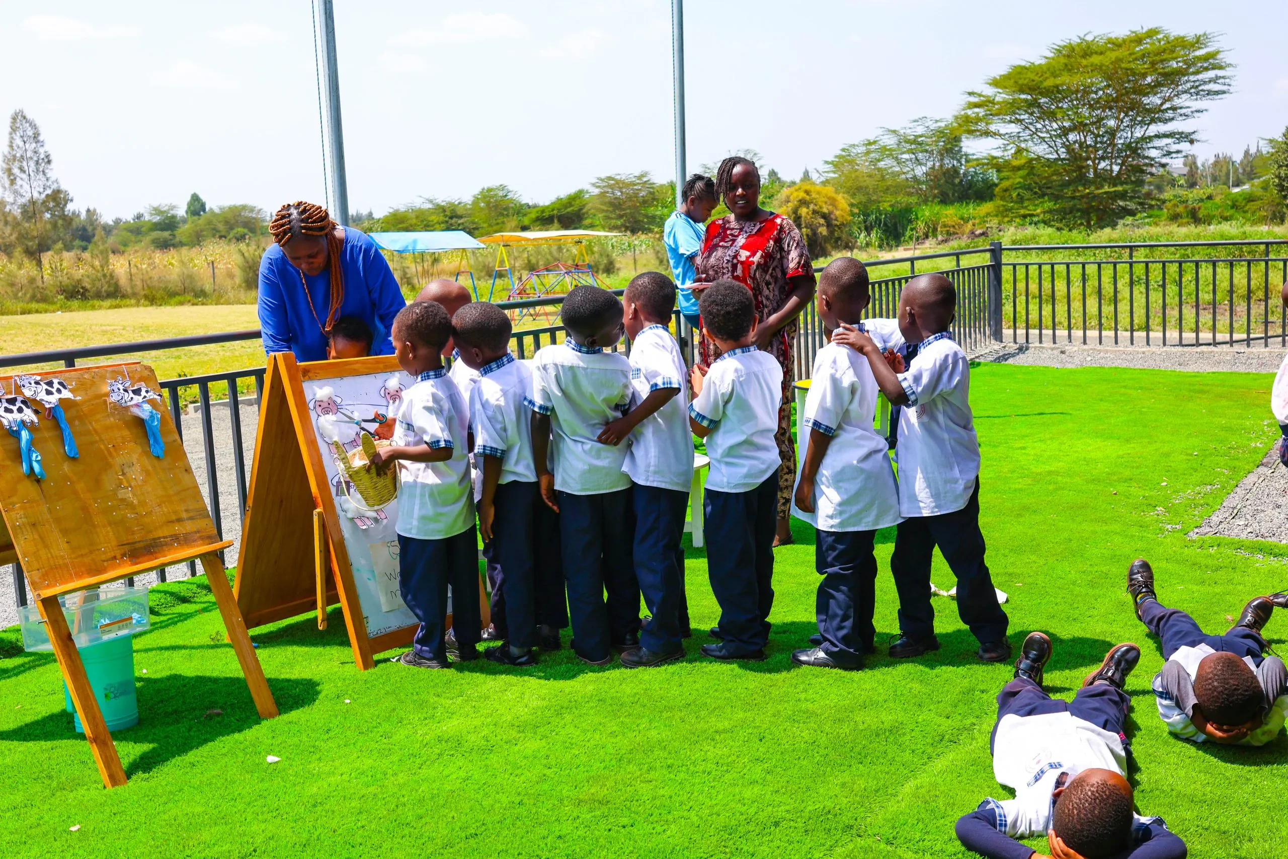 Lower primary students studying at their desks in a Kare Educational Centre classroom